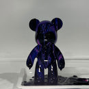 Bearbrick canvas covered in black, purple and pink paint